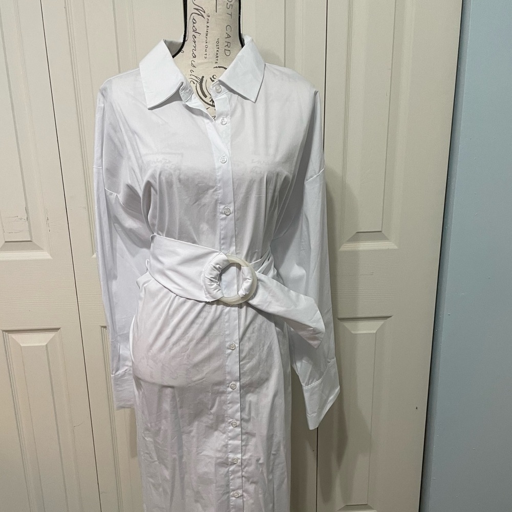 Eloquii button down dress with white belt.